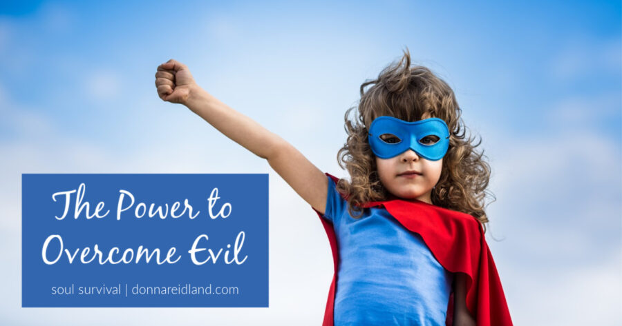 Girl in a superhero outfit with red boxing gloves and text that reads, The Power to Overcome Evil.