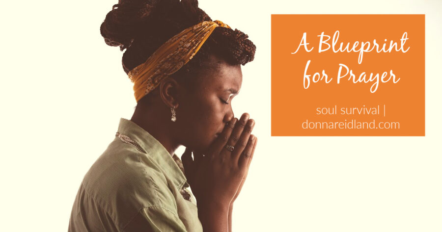 Beautiful African-American woman praying with text that reads, A Blueprint for Prayer