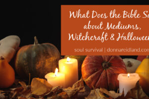 Display of pumpkins and candles with text that reads, What Does the Bible Say about Mediums, Witchcraft & Halloween?