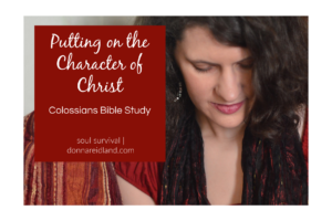 Woman with long dark hair looking down at her Bible with text that reads, Putting on the Character of Christ | Colossians Bible Study