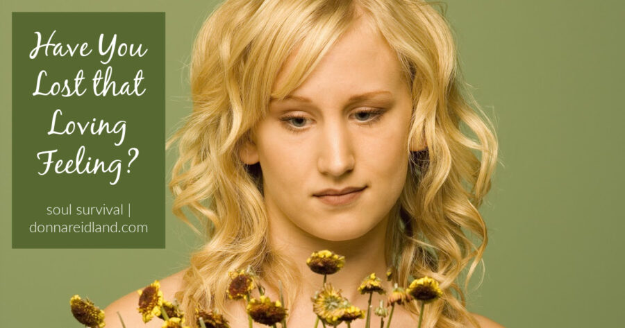 Young blond woman looking sadly at a bouquet of dead flowers with text that reads, Have You Lost that Loving Feeling?