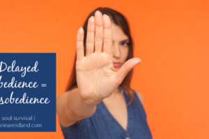 Woman holding up her hand in a stop gesture with text that reads, Delayed Obedience = Disobedience