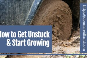 Pick-up truck stuck in the mud with text that reads, How to Get Unstuck & Start Growing.