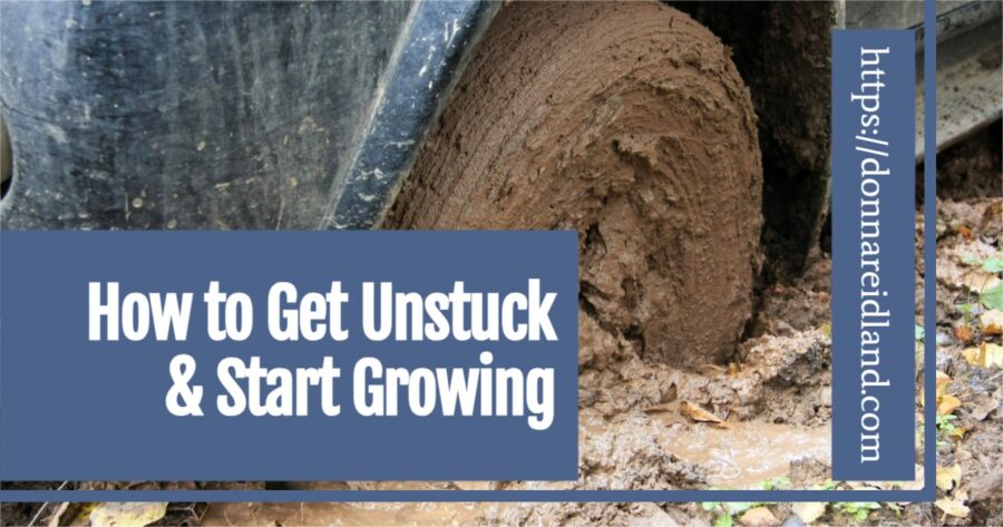 Pick-up truck stuck in the mud with text that reads, How to Get Unstuck & Start Growing.