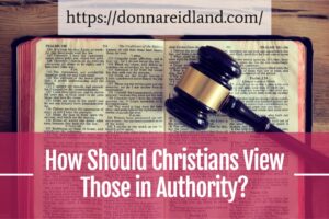 Gavel laying on top of an open bible with text that reads, How Should Christians View Those in Authority?