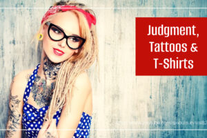 Young woman with tattoos and a red bandanna with text that reads, Judgment, Tattoos & T-Shirts.