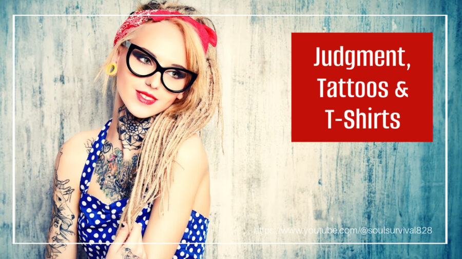 Young woman with tattoos and a red bandanna with text that reads, Judgment, Tattoos & T-Shirts.