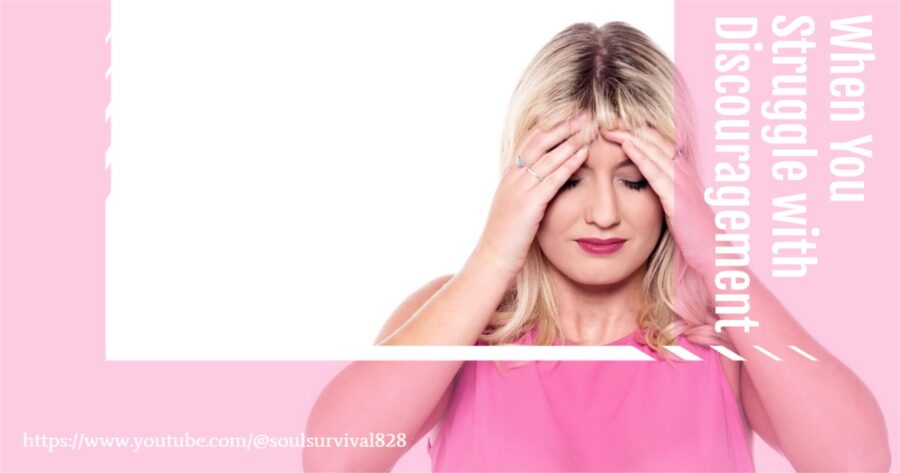 Woman in a bright pink blouse with her hands up to her head with text that reads, When We Struggle with Discouragement