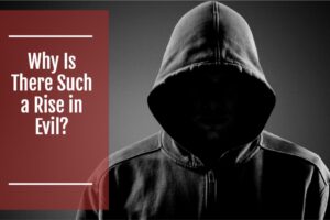 Faceless man in a dark hoodie with text that reads, Why Is There Such a Rise in Evil?