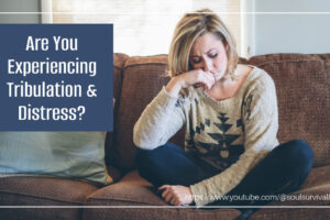 Sad woman sitting on a brown leather sofa with text that reads, Are You Experiencing Tribulation & Distress?