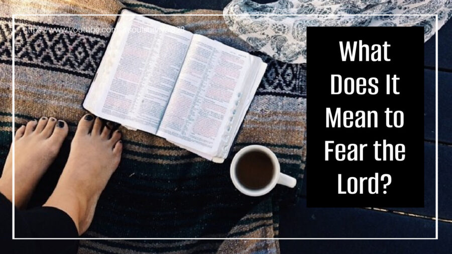 Woman's feet on a colorful blanket beside an open Bible and a cup of coffee with text that says, What Does It Mean to Fear the Lord?