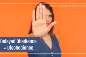 Young woman holding up her hand in a wait gesture with text that reads, Delayed Obedience = Disobedience