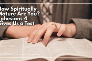 Woman's hands following along as she reads the Bible with text that reads: How Spiritually Mature Are You? Ephesians 4 Gives Us a Test