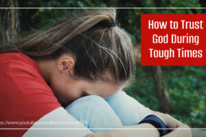 Sad and depresses woman with her head in her hands and text that reads, How to Trust God During Tough Times