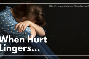 Sad, depressed woman with her head on her knees