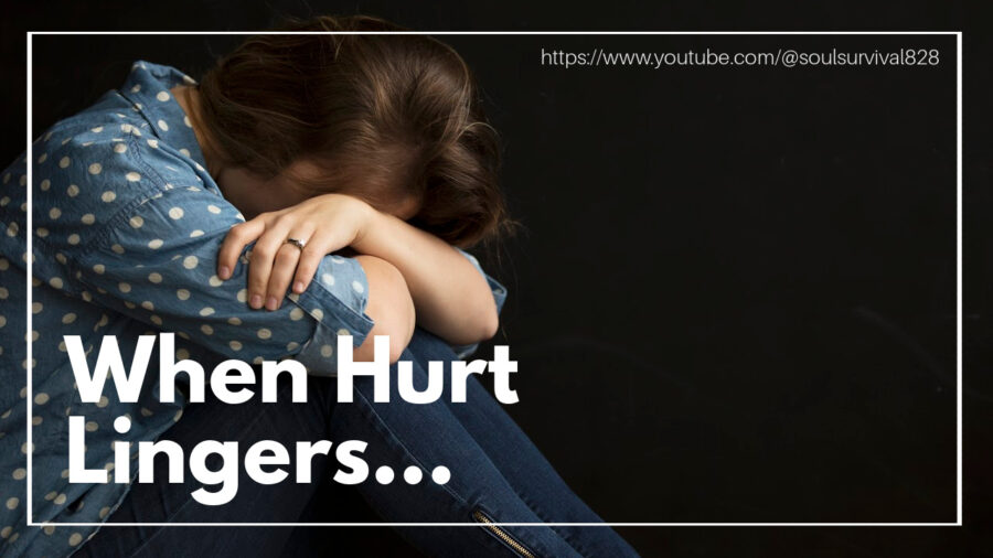 Sad, depressed woman with her head on her knees