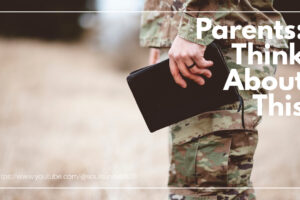Soldier in uniform with a bible in his hand