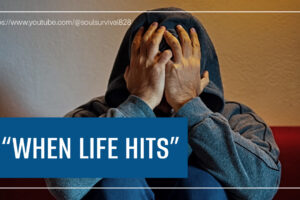 Distressed woman with her hands up to her face